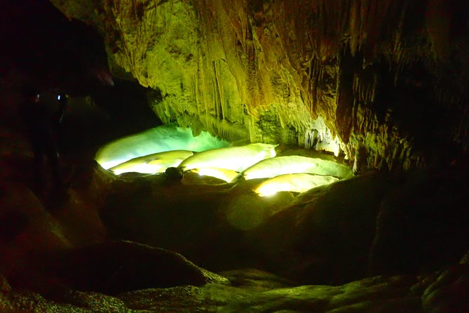 Okinawa Miyako Is a Place in Japan Known for Its Mysterious Charm. One of Its Popular Attractions Is the 'Ryugu Miyagi' Exploration, Where Visitors Can Explore the Fascinating Pumpkin Limestone Caves. - A Journey Into the Mysterious Depths of Okinawa Miyako
