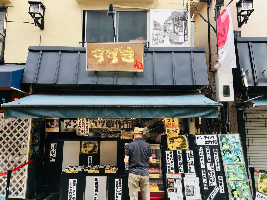 Yanaka & Nezu: Walking Tour in Tokyo's Nostalgic Old Towns - Ancient Traditions: Nezu Shrine and Torii Gate Tunnel